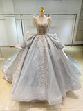 Silver Glimmer V-Neck Ballgown: Crystal-Embroidered Bust & Dramatic Bow Train