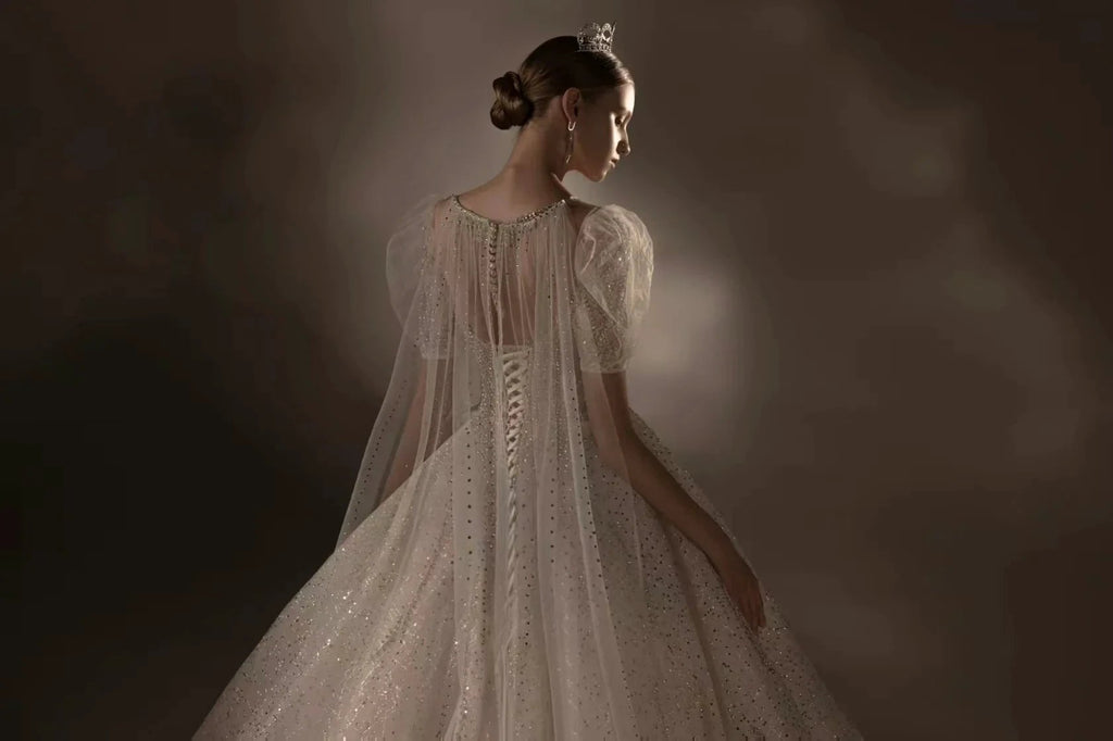 Sparkling Ball Gown Sweetheart Neck Tulle Wedding Dress with Beaded Embroidery & Sheer Puff Sleeves Q6021