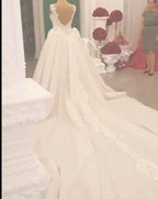 Classy Long Sweetheart Spaghetti Straps Appliques Lace Crystal Backless Wedding Dress