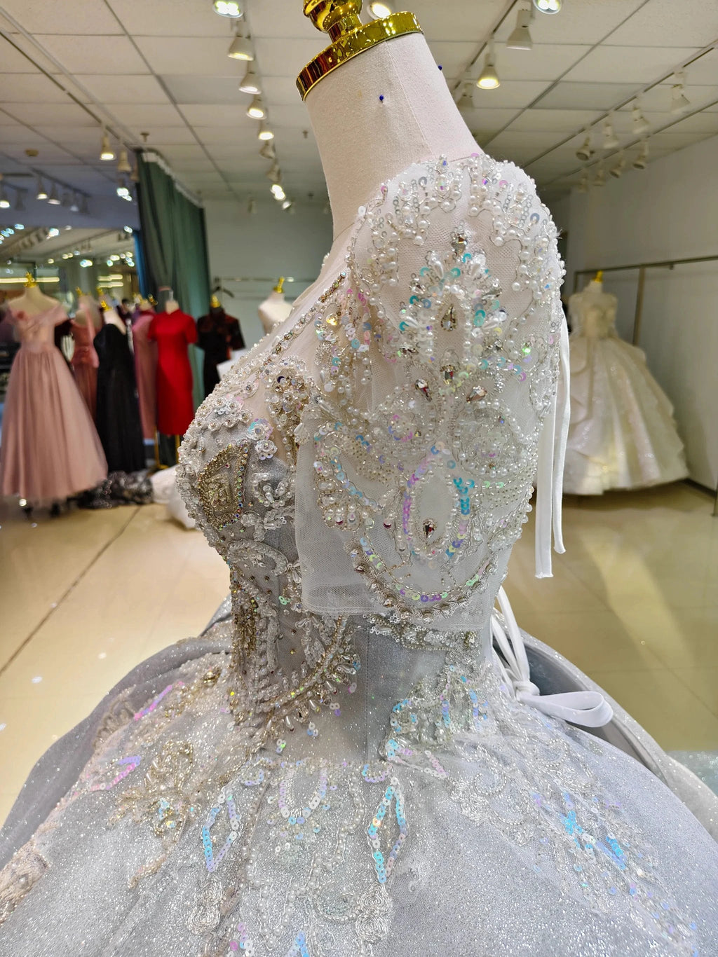 Silver Glimmer V-Neck Ballgown: Crystal-Embroidered Bust & Dramatic Bow Train