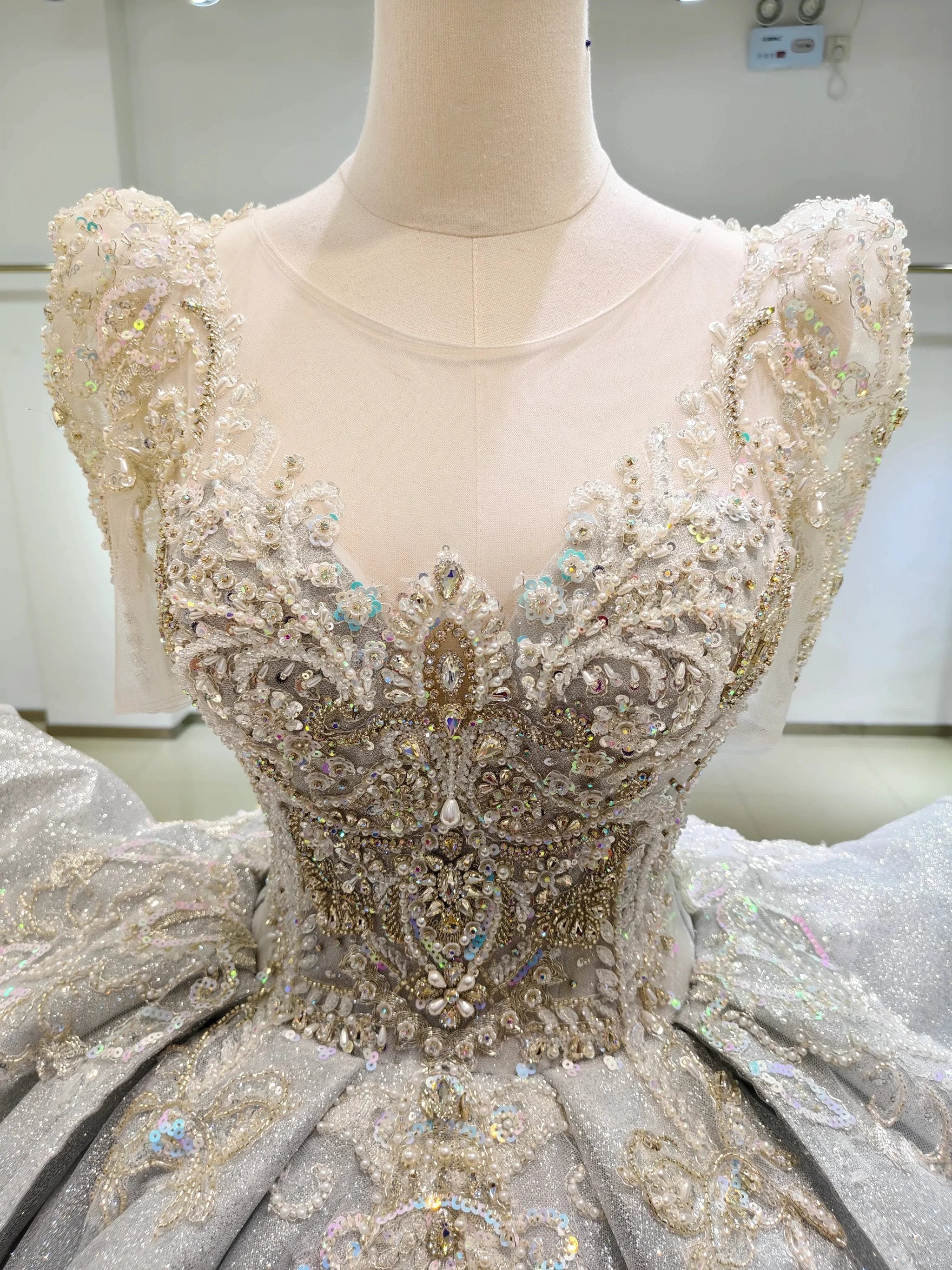 Silver Glimmer V-Neck Ballgown: Crystal-Embroidered Bust & Dramatic Bow Train
