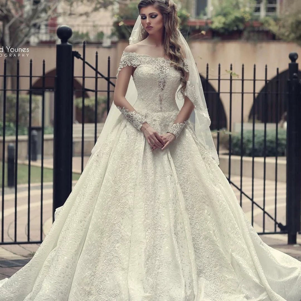 Elegant Long A-Line Off-the-Shoulder Backless Appliques Lace Wedding Dress with Sleeves