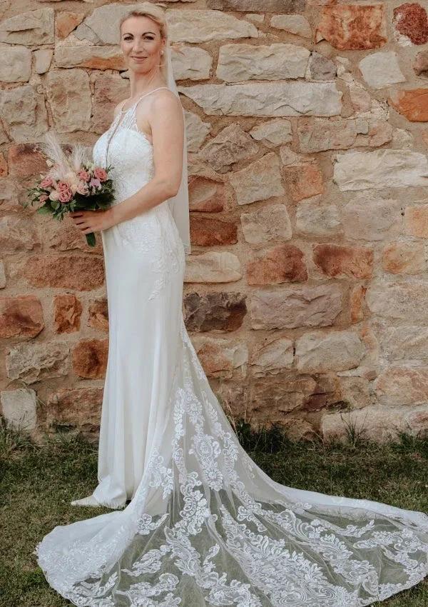 Elegant Long White Mermaid Sleeveless Lace Backless Wedding Dress with Train