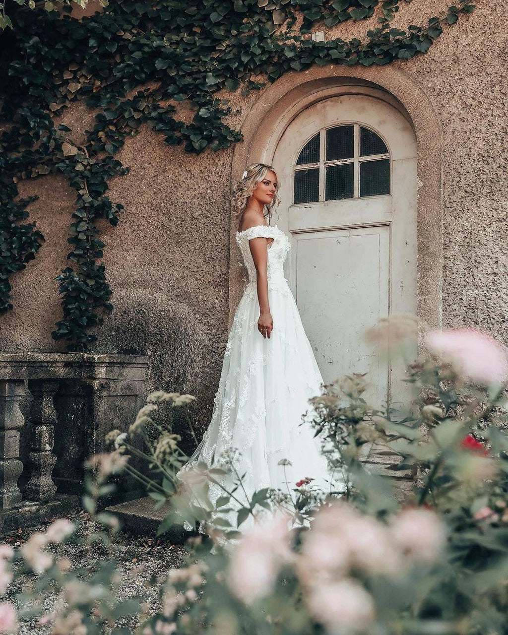 Long A-line Off-the-shoulder 3D Flroal Wedding Dress with Lace Appliques