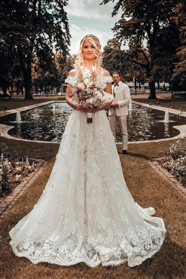 Long A-line Off-the-shoulder 3D Flroal Wedding Dress with Lace Appliques