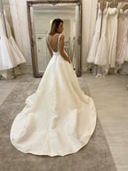 Long A-Line V-neck Spaghetti Straps Backless Wedding Dress With Pockets
