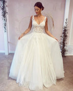 Stunning Long A-Line V-neck Backless Wedding Dress With Appliques Lace